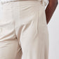 Light beige work pants fabric with stitched back yoke and adjustable side seam detail