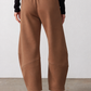 Mocha work scuba pants with elastic waistband, back seams, ankle-length relaxed legs