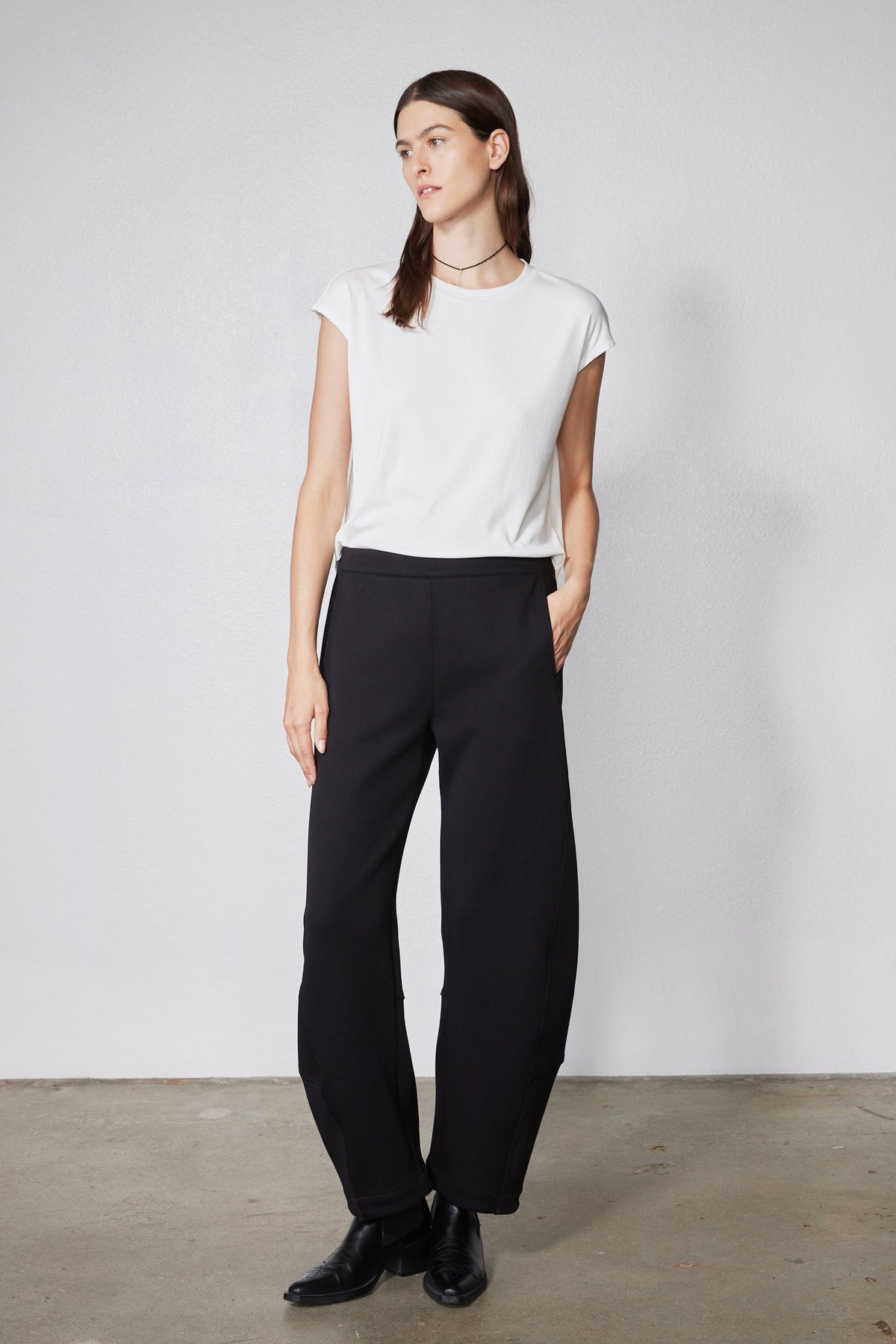 Black work scuba pants with wide-leg fit and high-rise waistband