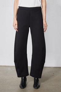 Black work scuba pants front view with wide straight legs and ankle hem