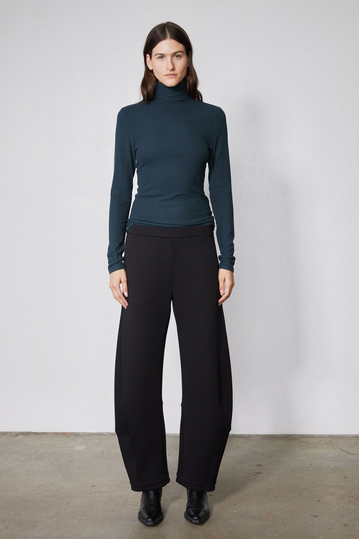 Black work scuba pants with wide straight legs and ankle-length hem