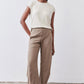 Tan loose work pants with elastic waistband and cuffed tapered legs