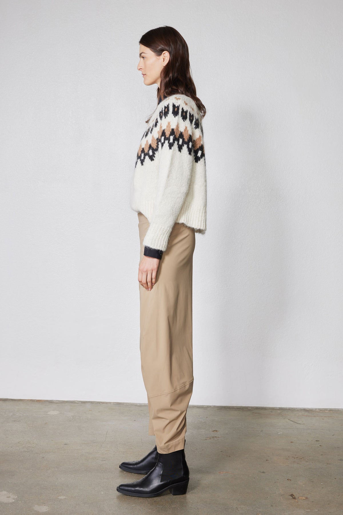 Dune tan relaxed work pants in side profile, straight legs and ankle-length hem