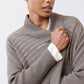 Sea gray open-knit cardigan close-up with ribbed turtleneck and long sleeves