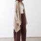 Open knit cardigan in light beige, open front and asymmetric draped hem