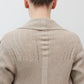 Open knit cardigan back view in light beige, ribbed texture and vertical seam detail