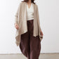 Open knit cardigan in light beige with open front, long sleeves, draped hem