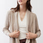 Open knit cardigan in light beige with long sleeves and open drape front