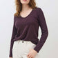 Lace-trim V-neck long sleeve top in dark plum, with slightly curved hem