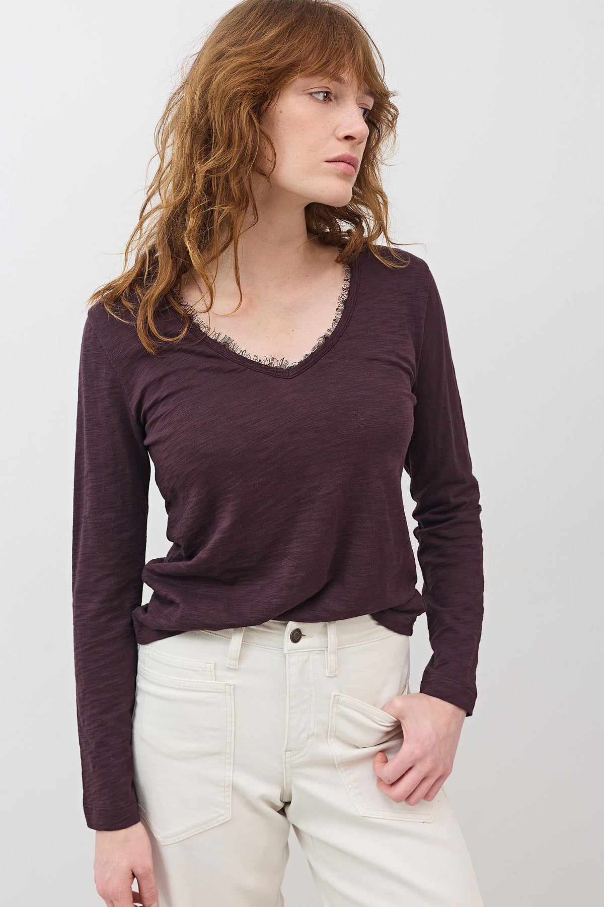 Burgundy V-neck lace-trim long-sleeve top with draped neckline