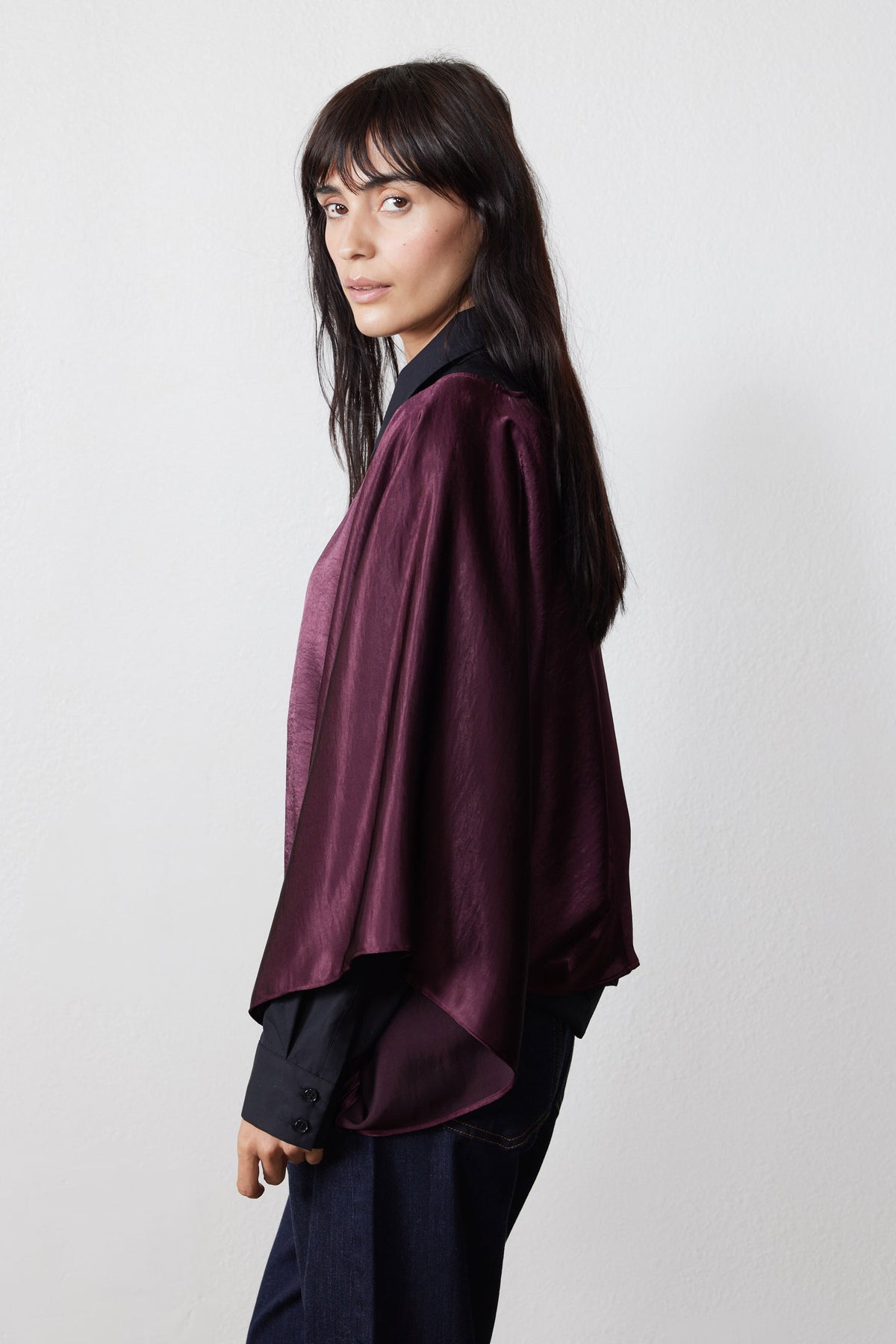 Midnight plum oversized flowy top with draped side profile and loose batwing sleeves