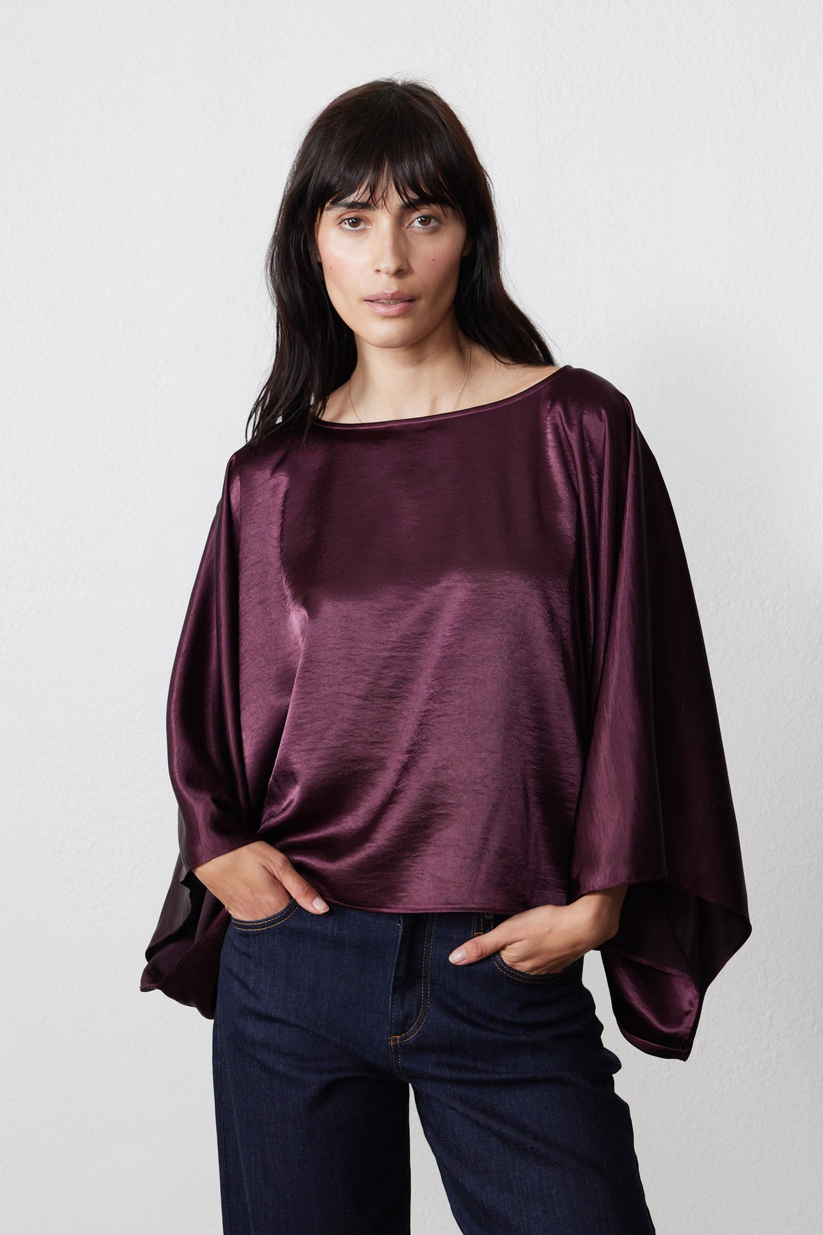 Midnight plum oversized top with boat neckline and wide dolman sleeves