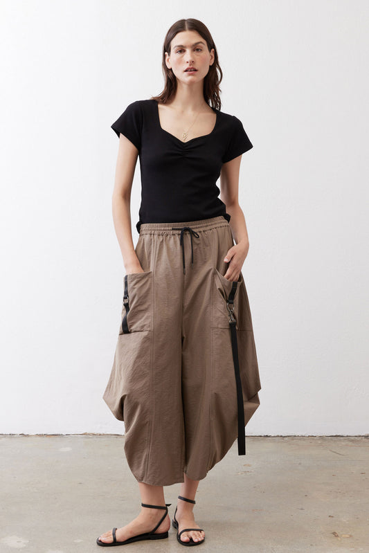 Black square-neck top with ruched neckline and short sleeves, fitted front view