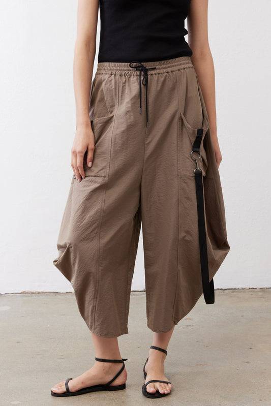 Walnut wide-leg parachute pants with elastic drawstring waist and side pocket detailing