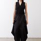 Black parachute wide-leg pants with drawstring waist and side pocket loops.