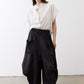 Black parachute wide-leg pants with drawstring waist and cargo pockets