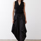 Black wide-leg parachute pants with elastic waist, cargo pockets, and ankle-length drape.