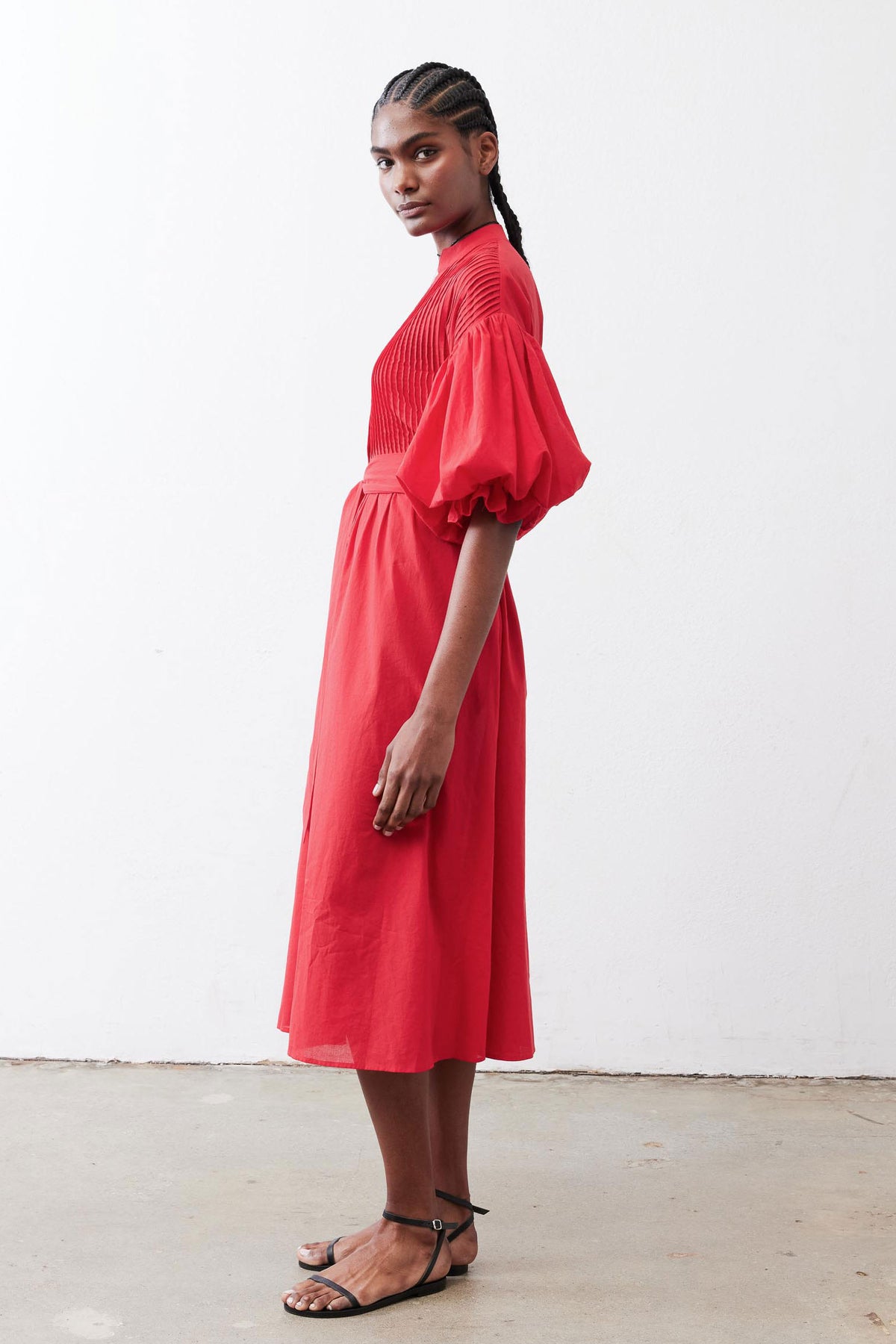 Crimson poplin midi dress with V-neck and gathered puff sleeves, side view