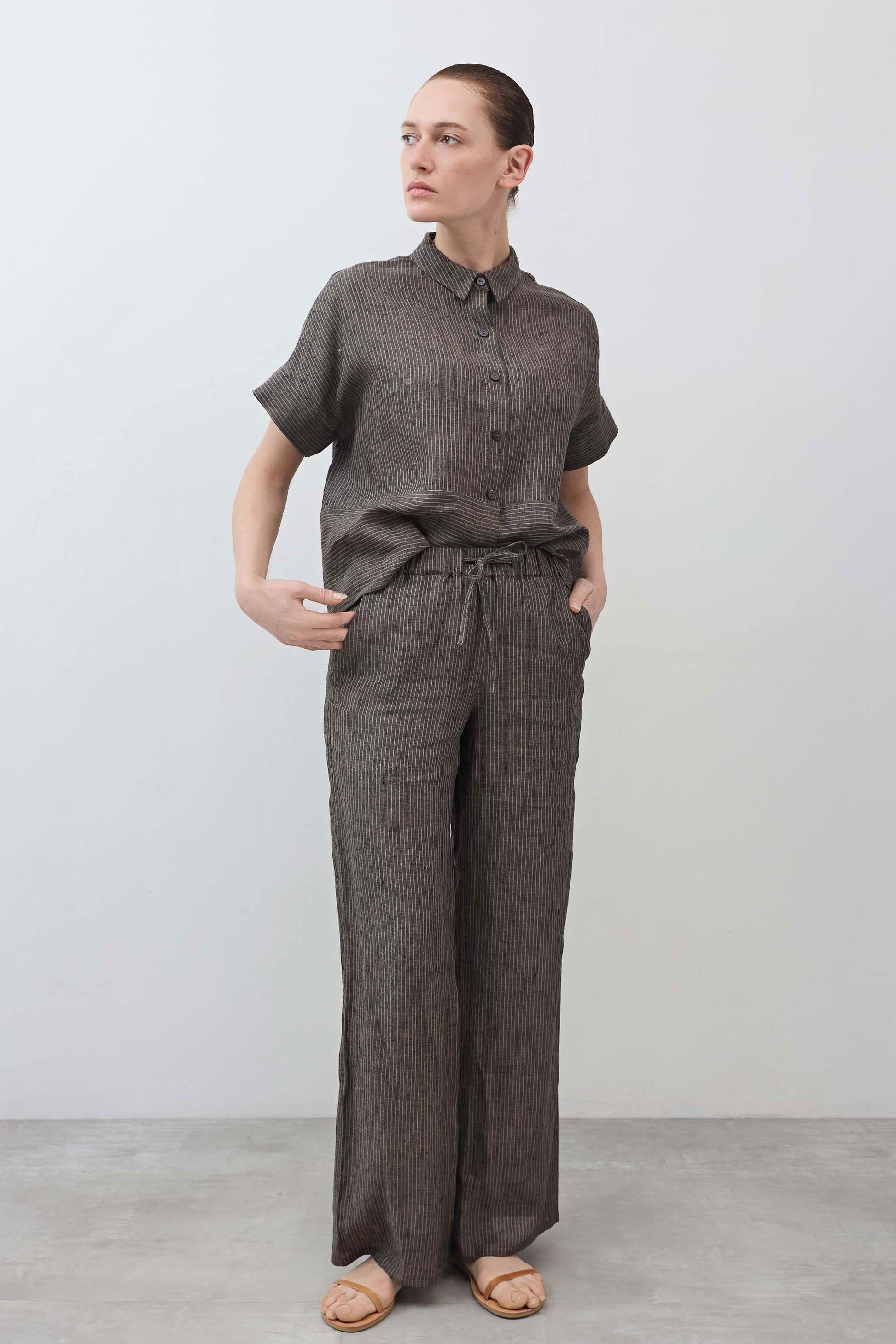 Charcoal striped linen wide-leg pants with drawstring waist and full-length legs