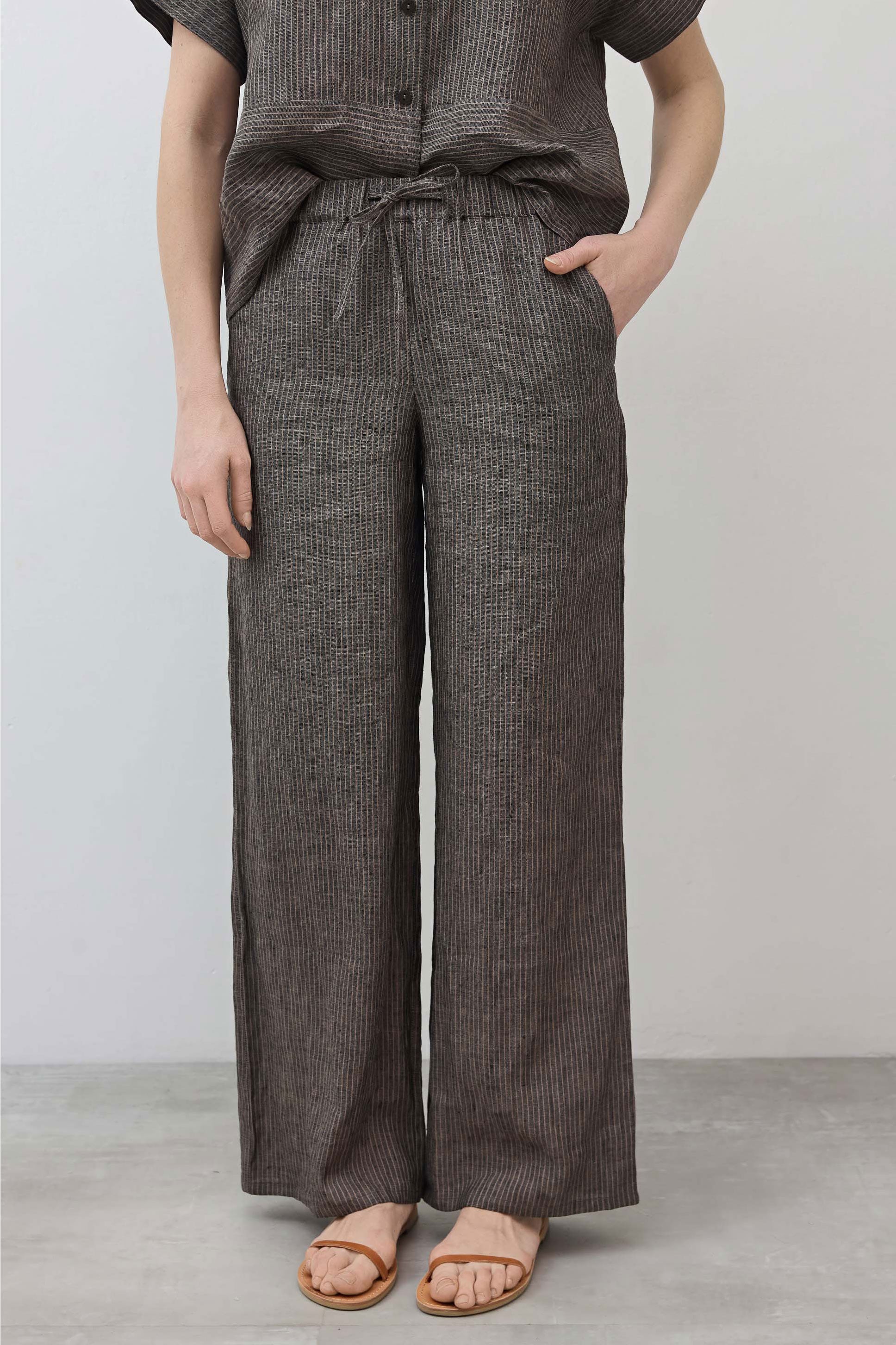 Charcoal pinstripe wide-leg linen pants with tied drawstring pull-on waist
