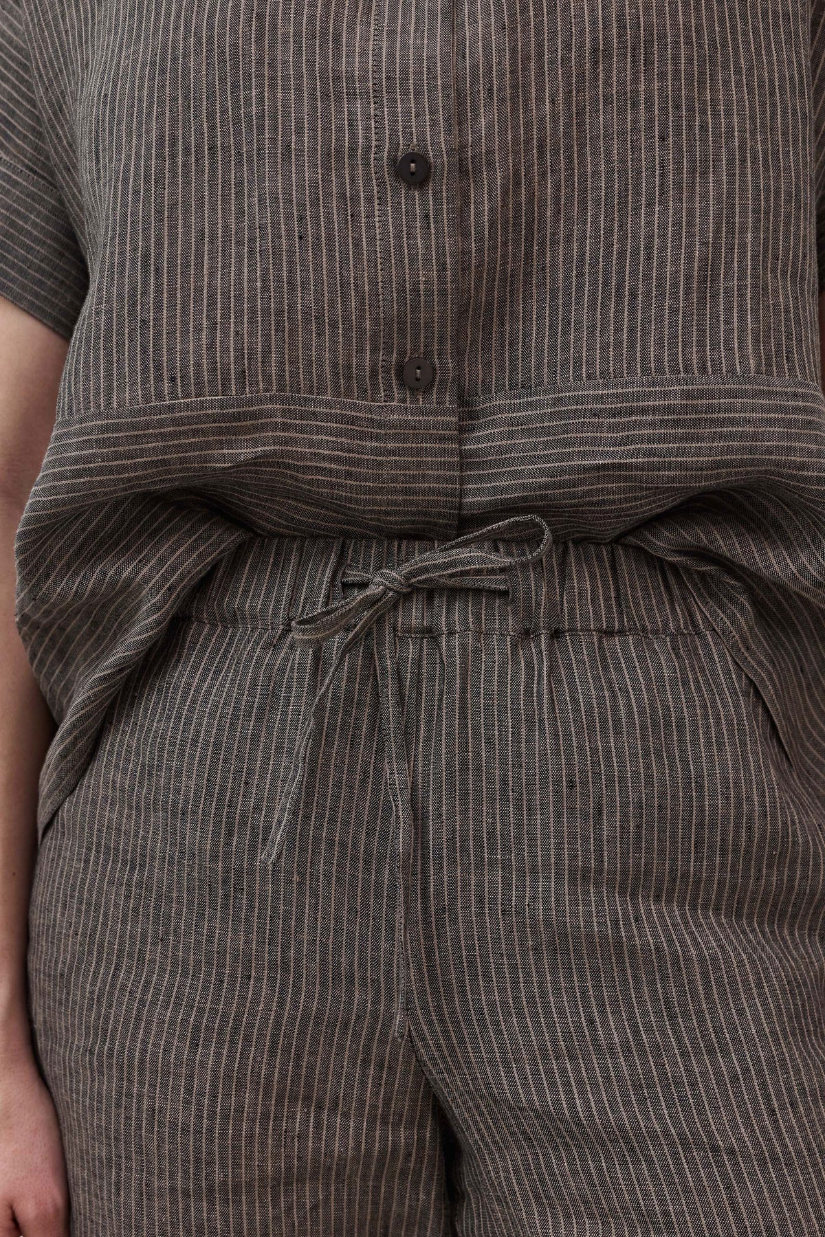 Charcoal striped linen pants with gathered drawstring waist detail