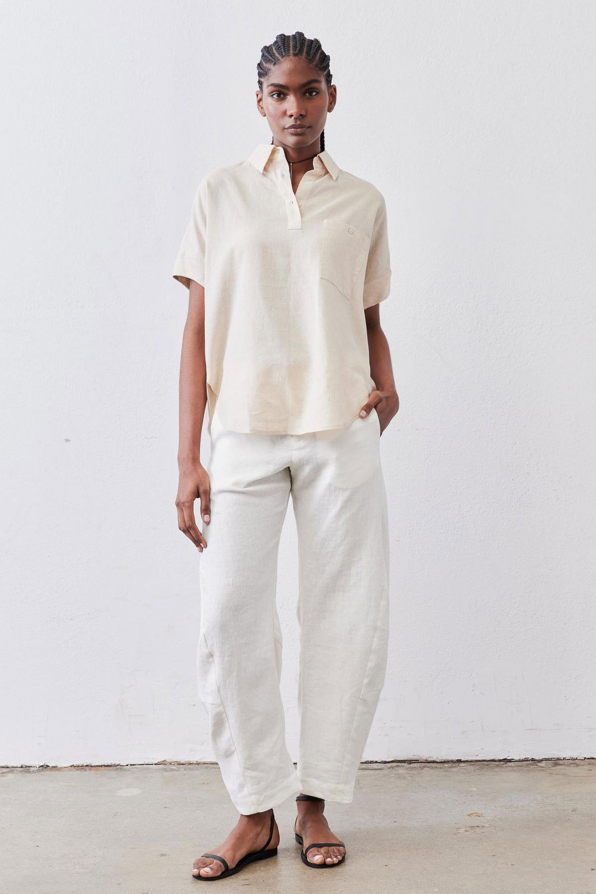 Oat linen short-sleeve blouse with collar, button placket, and relaxed fit