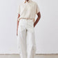 Oat linen short-sleeve blouse with button-up front and collar