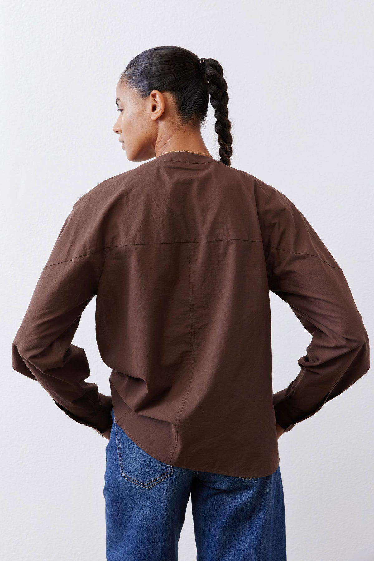 Deep umber poplin raglan blouse back view with long sleeves