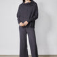 Charcoal cowl-neck sweater and wide-leg lounge pants with drawstring, full view