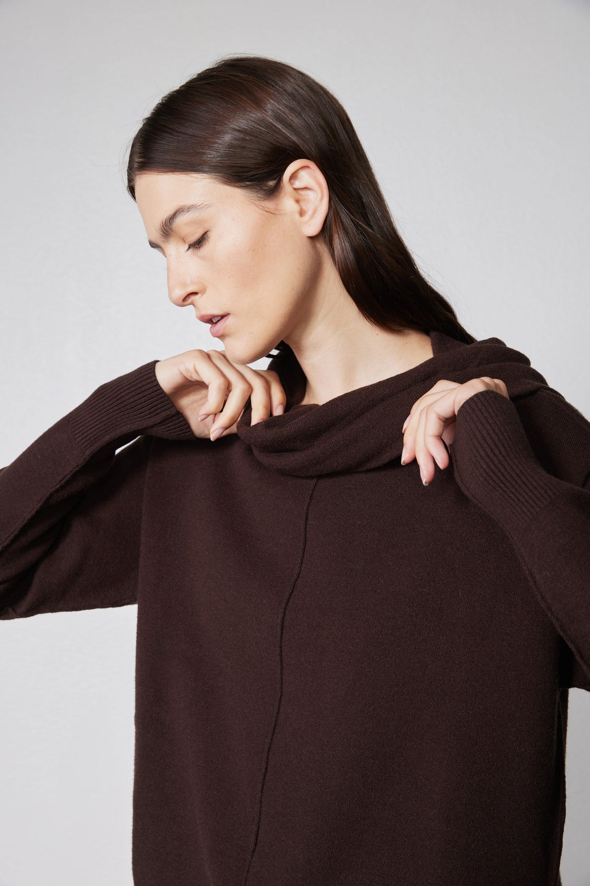Chocolate plum cowl-neck sweater detail with draped collar and long sleeves