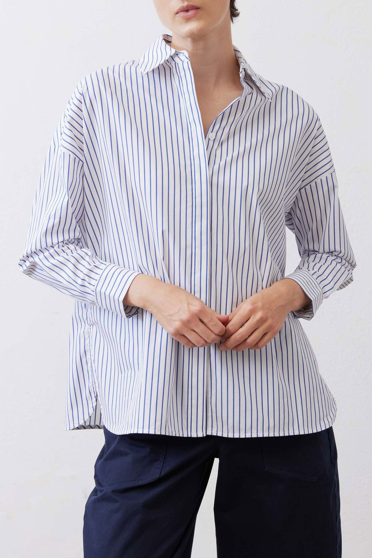 White and navy striped oversized tunic with collared button front and long sleeves