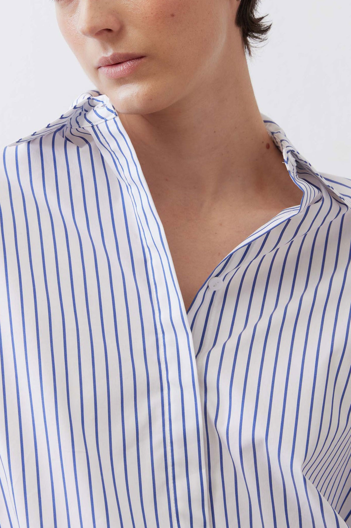 White and navy striped oversized tunic with collared V neckline