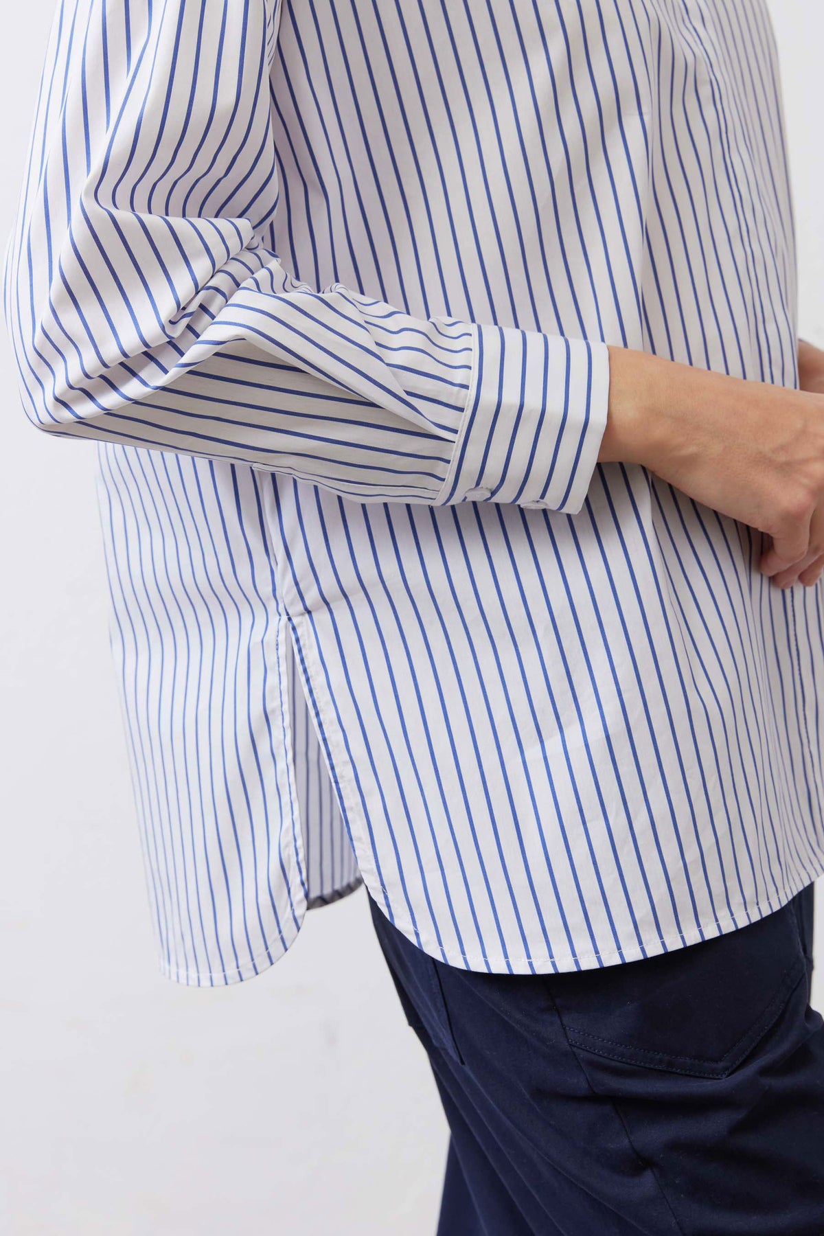 White and navy striped oversized tunic with cuffed long sleeve and side drape