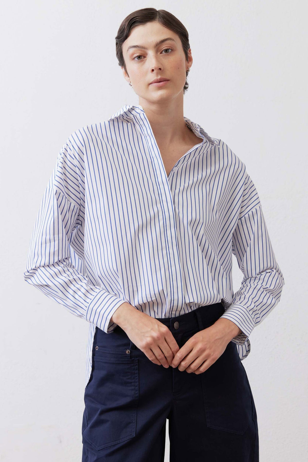 White and navy striped oversized tunic with collared V neckline and button front