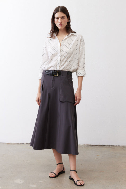 White oversized tunic with black dot print, button-front and slightly puffed sleeves
