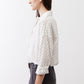 White oversized tunic with small black dot print and loose gathered sleeves