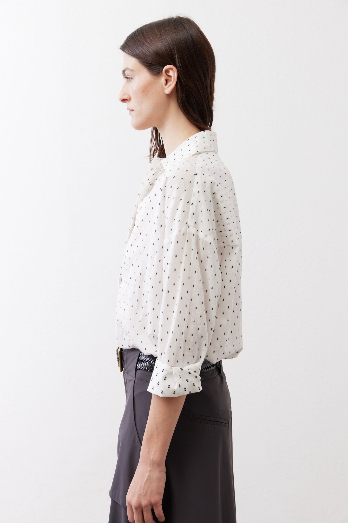 White oversized tunic with small black dot print and loose gathered sleeves