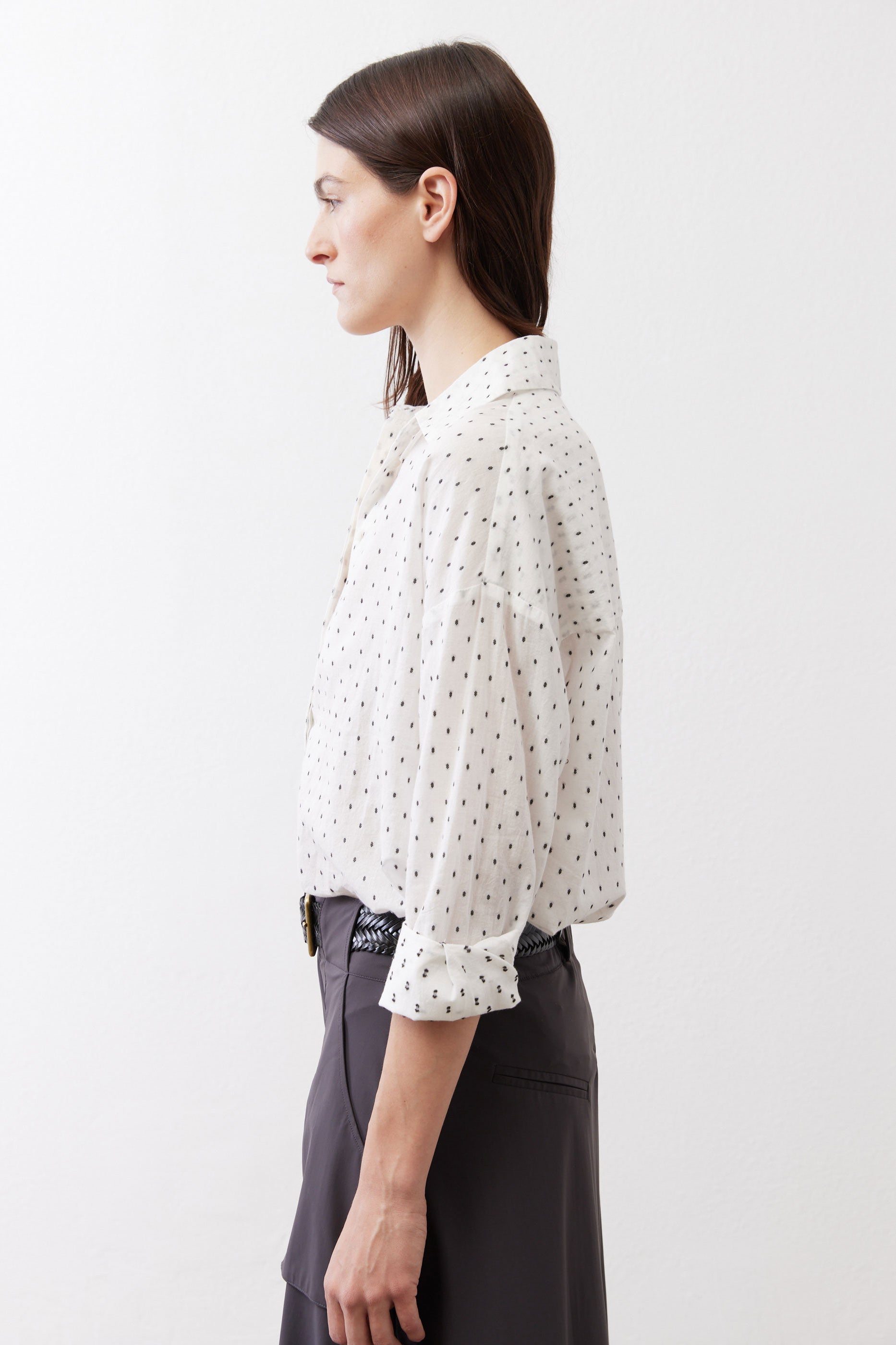 White oversized tunic with small black dot print and loose gathered sleeves