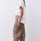 Walnut-brown relaxed cargo barrel pants with side cargo pockets, cuffed hems