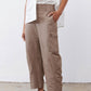 Taupe-brown cargo barrel pants with flap side pocket and cuffed ankle hem
