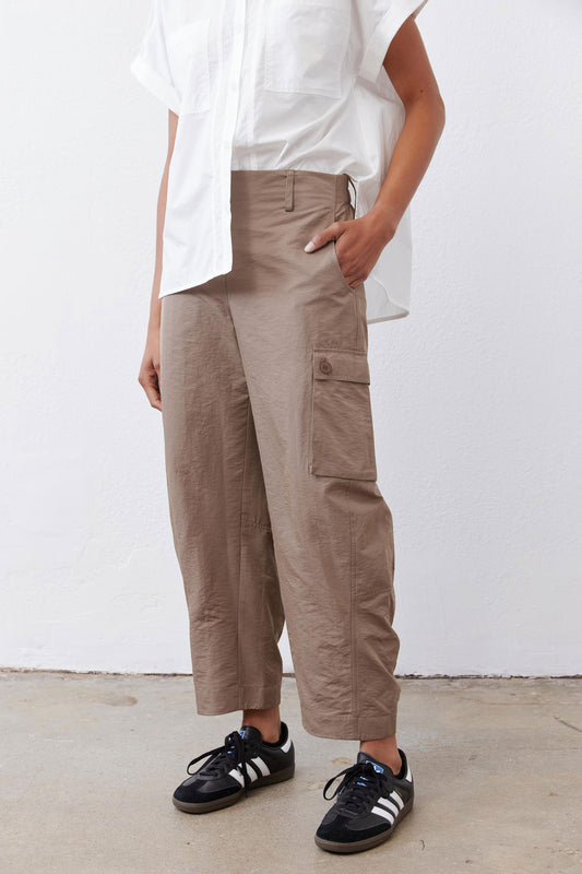 Taupe-brown cargo barrel pants with flap side pocket and cuffed ankle hem