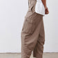Taupe-brown cargo barrel pants with side patch pocket and cuffed ankle hem