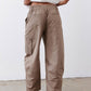 Walnut-brown barrel pants with elastic waist, front cargo pockets, cuffed hem