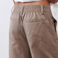 Walnut-brown elastic-waist cargo barrel pants with side patch pocket details