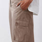Walnut-brown cargo barrel pants with flap pocket and button closure