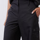 Black cargo barrel pants with button front, side pocket, and cargo flap pocket
