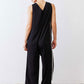 Black relaxed wide-leg sleeveless jumpsuit with white side stripe, back view