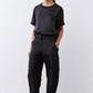 Black relaxed silk top with crew neck, short sleeves, relaxed drape