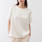 Ivory relaxed silk top with short sleeves and crew neck, laid-back fit