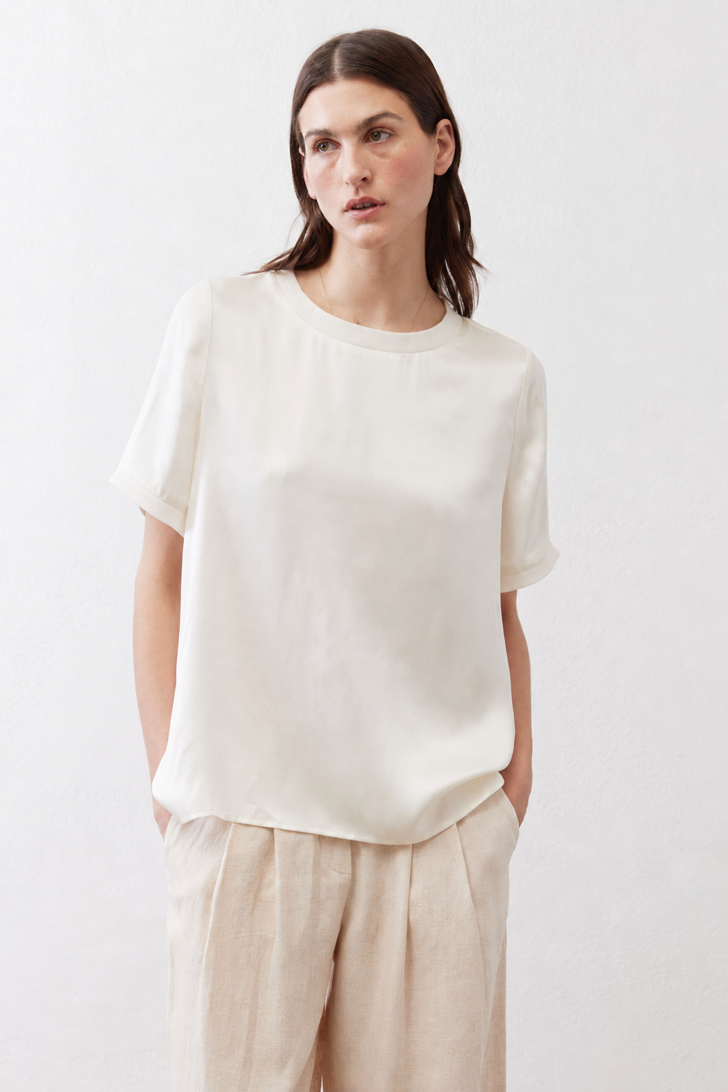 Ivory relaxed silk top with short sleeves and crew neck, laid-back fit